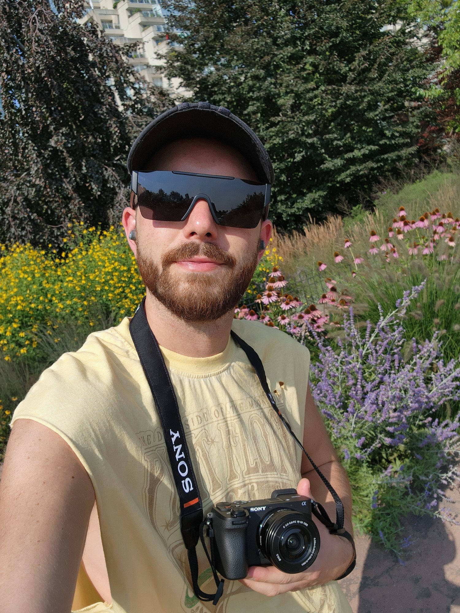 Justin with camera in the field